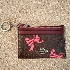 COACH Maroon & Pink Bow Print skinny ID Case